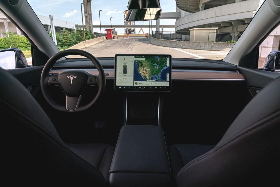 2022-tesla-model-y-interior-photo-dashboard-and-steering-wheel