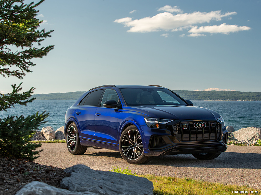 2023-blue-audi-sq8-standing-near-the-beach-side-with-a-front-view