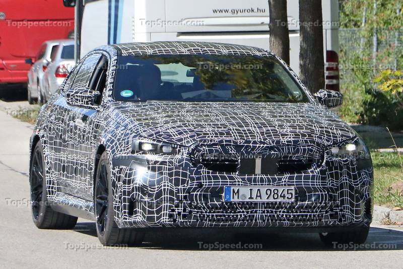 2024-bmw-m5-spy-shot-with-thinner-camourflage