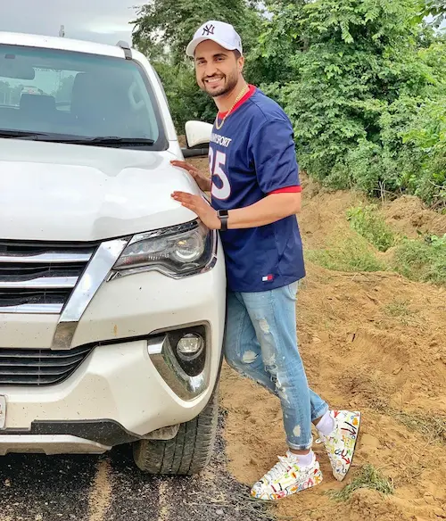 Jassie-gill-with-his-toyota-fortuner
